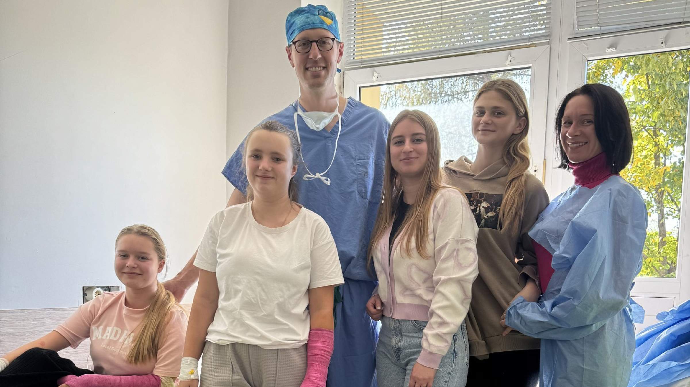 Dr. Mendenhall with patient in Ukraine